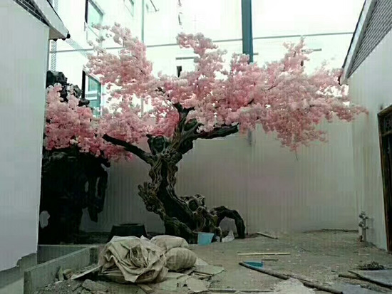 张家口塑石门口_***设计大型假山假树